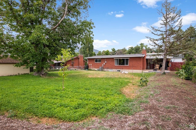 784 Lavina Dr, South Ogden, UT 84403 - view of yard featuring a patio