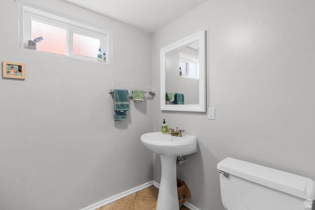 784 Lavina Dr, South Ogden, UT 84403 - half bathroom with toilet and tile patterned floors