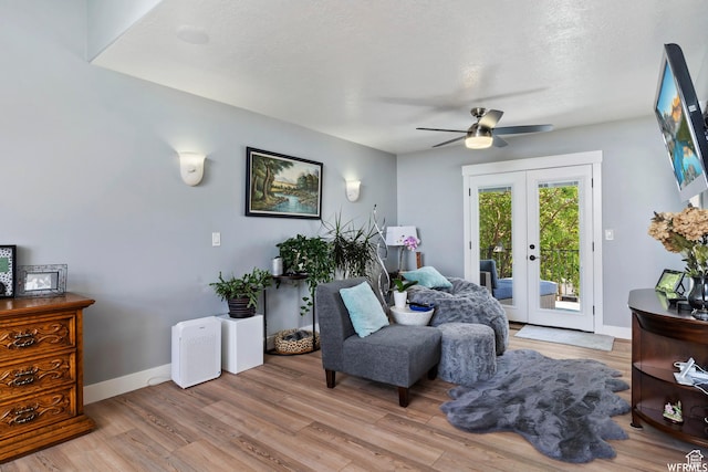 2484 W Gordon Ave, Layton, UT 84041 - sitting room featuring french doors, a ceiling fan, and wood finished floors