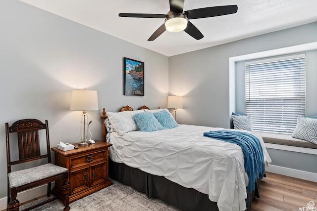 2484 W Gordon Ave, Layton, UT 84041 - bedroom with light wood-style floors and a ceiling fan