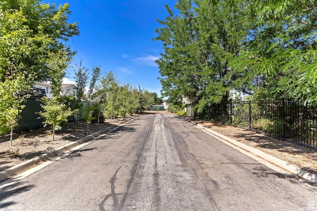 2484 W Gordon Ave, Layton, UT 84041 - view of asphalt road with curbs