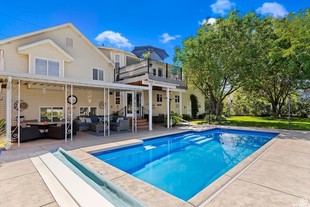 2484 W Gordon Ave, Layton, UT 84041 - outdoor pool featuring an outdoor hangout area, a patio area, french doors, entry steps, and a lawn