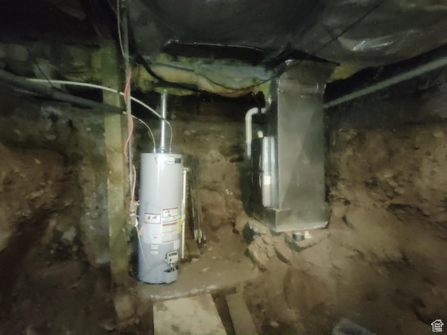 217 Wilkins, East Carbon, UT 84520 - utility room featuring gas water heater and heating unit