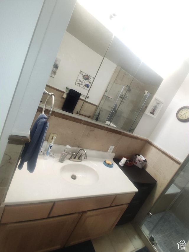 217 Wilkins, East Carbon, UT 84520 - bathroom with vanity and tile walls