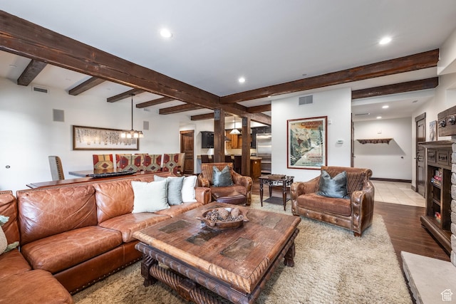 1825 Three Kings Dr Unit 3101, Park City, UT 84060 - living room with beamed ceiling, recessed lighting, a fireplace, and wood finished floors