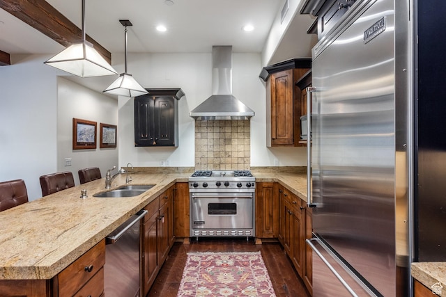 1825 Three Kings Dr Unit 3101, Park City, UT 84060 - kitchen with premium appliances, wall chimney exhaust hood, a peninsula, dark wood-style floors, and brown cabinetry