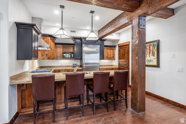 1825 Three Kings Dr Unit 3101, Park City, UT 84060 - kitchen with stainless steel appliances, a peninsula, dark wood finished floors, light stone countertops, and pendant lighting