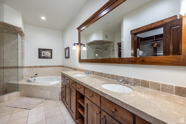 1825 Three Kings Dr Unit 3101, Park City, UT 84060 - full bath with a shower stall, tile patterned floors, double vanity, a garden tub, and a spacious closet