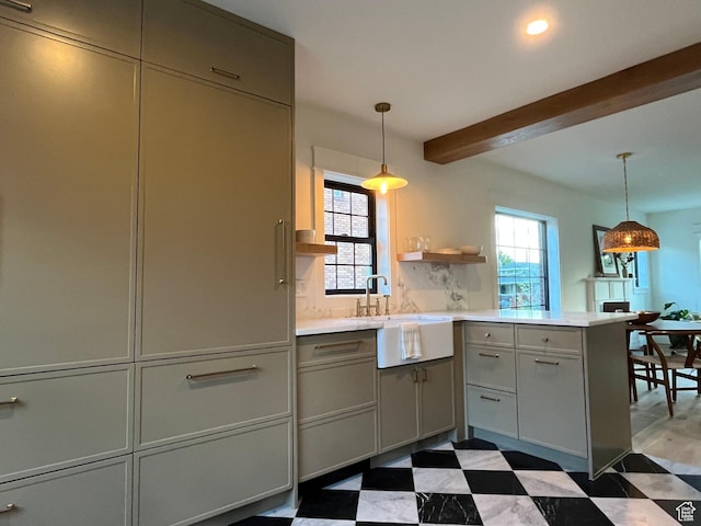 2487 S Beverly St E, Salt Lake City, UT 84106 - kitchen with gray cabinets, dark floors, beam ceiling, light countertops, and a peninsula