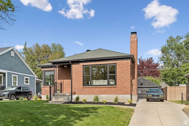 2487 S Beverly St E, Salt Lake City, UT 84106 - bungalow-style home with brick siding, a chimney, and an outdoor structure