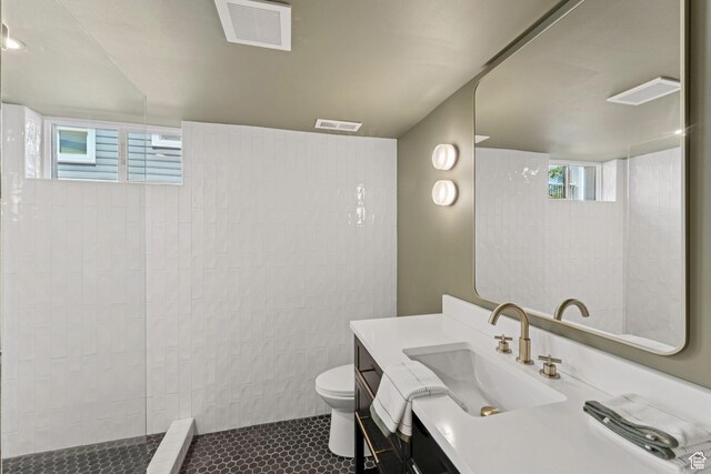 2487 S Beverly St E, Salt Lake City, UT 84106 - full bathroom featuring vanity and a walk in shower
