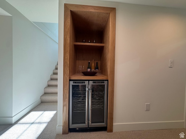 2487 S Beverly St E, Salt Lake City, UT 84106 - indoor dry bar with beverage cooler, carpet, and stairway
