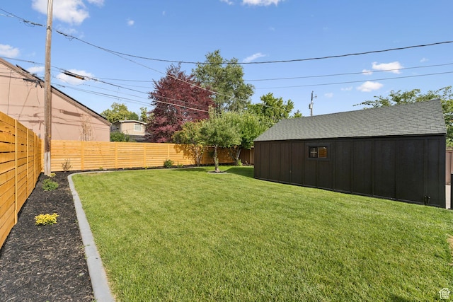 2487 S Beverly St E, Salt Lake City, UT 84106 - fenced backyard with a storage unit