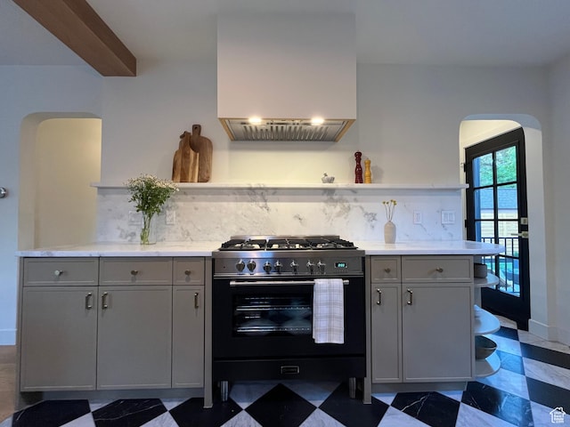 2487 S Beverly St E, Salt Lake City, UT 84106 - kitchen with high end range, open shelves, gray cabinetry, and extractor fan