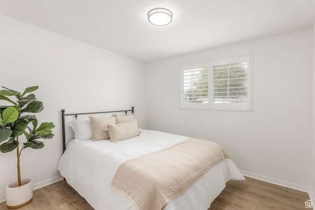 5655 S 700 W, Murray, UT 84123 - bedroom with wood finished floors and baseboards