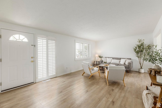 5655 S 700 W, Murray, UT 84123 - living room featuring light wood-style flooring and baseboards