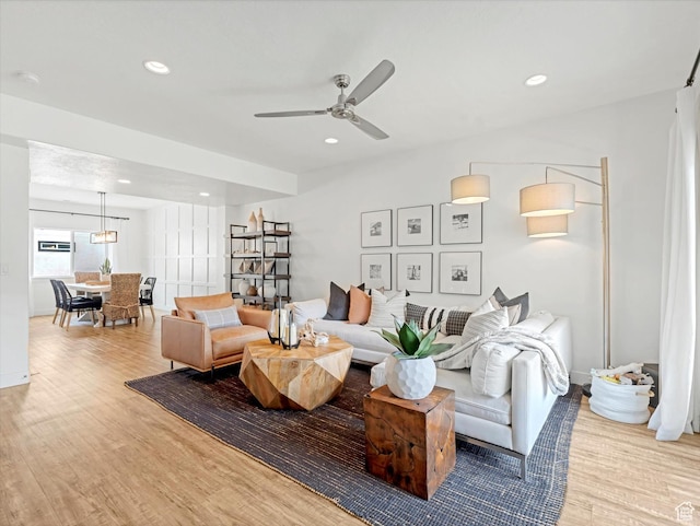 14735 S Asher Ln W, Bluffdale, UT 84065 - living area featuring wood finished floors, ceiling fan, and recessed lighting