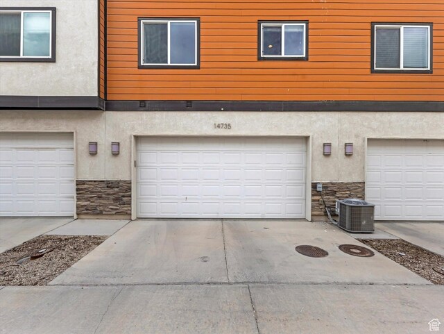 14735 S Asher Ln W, Bluffdale, UT 84065 - garage featuring driveway