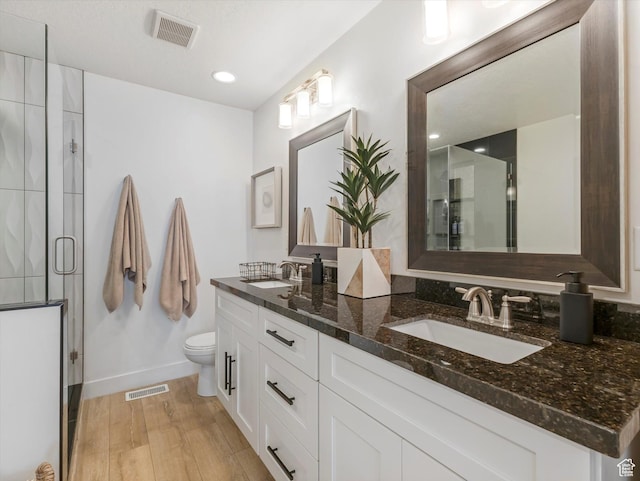 14735 S Asher Ln W, Bluffdale, UT 84065 - bathroom featuring double vanity, wood finished floors, and a shower stall