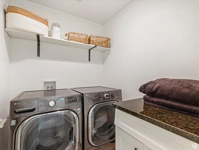 14735 S Asher Ln W, Bluffdale, UT 84065 - laundry room with washing machine and clothes dryer and wood finished floors