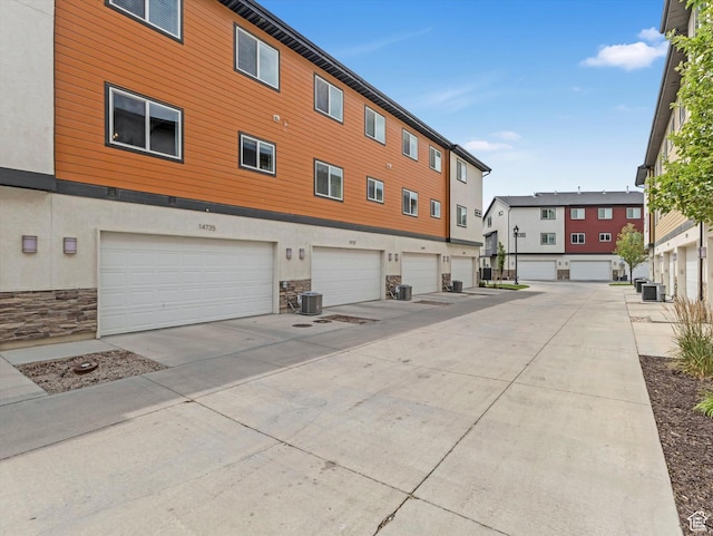 14735 S Asher Ln W, Bluffdale, UT 84065 - view of property featuring a garage and driveway