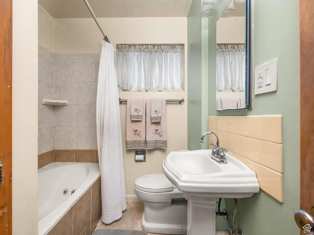 920 S 150 E, Orem, UT 84058 - bathroom featuring tiled shower / bath combo and tile patterned flooring