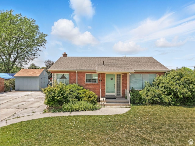 920 S 150 E, Orem, UT 84058 - ranch-style home with brick siding, a chimney, a front lawn, and roof with shingles