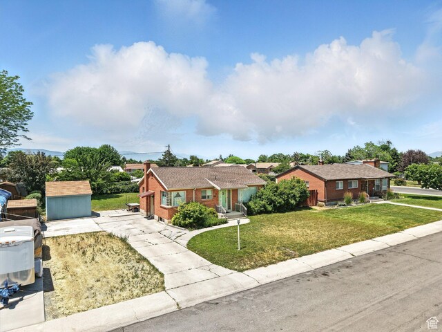 920 S 150 E, Orem, UT 84058 - ranch-style home featuring a front yard, brick siding, and concrete driveway