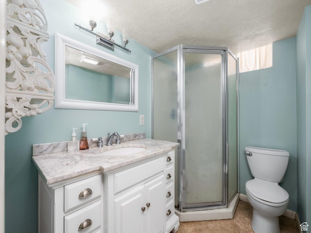 920 S 150 E, Orem, UT 84058 - bathroom with vanity, a shower stall, and a textured ceiling