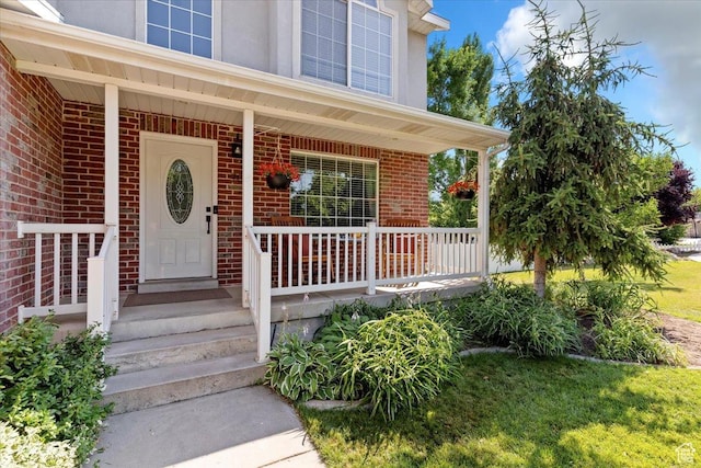 707 W 3675 S, Riverdale, UT 84405 - property entrance with brick siding and a porch