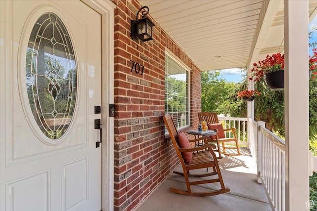 707 W 3675 S, Riverdale, UT 84405 - view of exterior entry featuring brick siding and covered porch