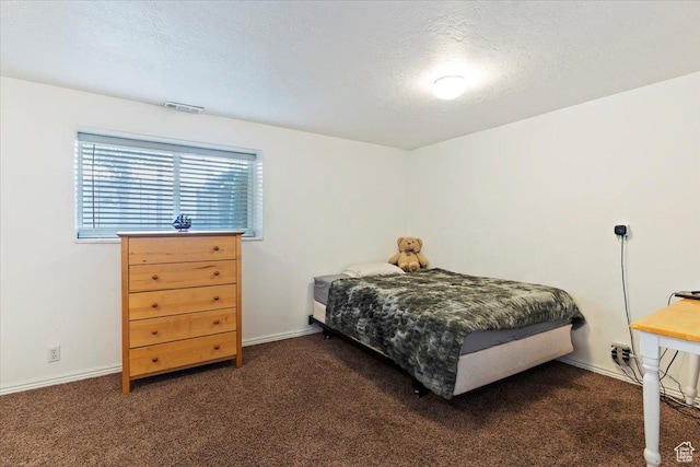 707 W 3675 S, Riverdale, UT 84405 - carpeted bedroom featuring a textured ceiling and baseboards