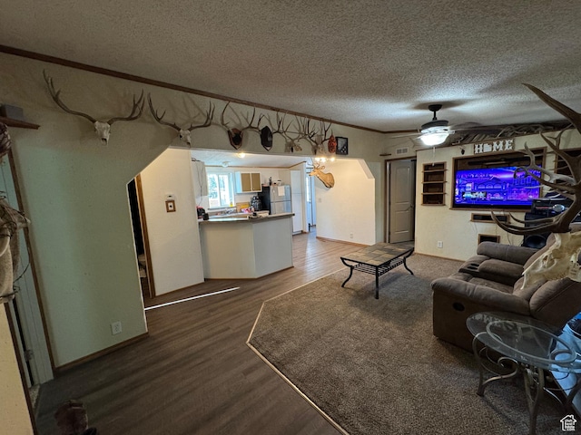 1082 W 650 S, Vernal, UT 84078 - living room with a textured ceiling, wood finished floors, crown molding, and ceiling fan