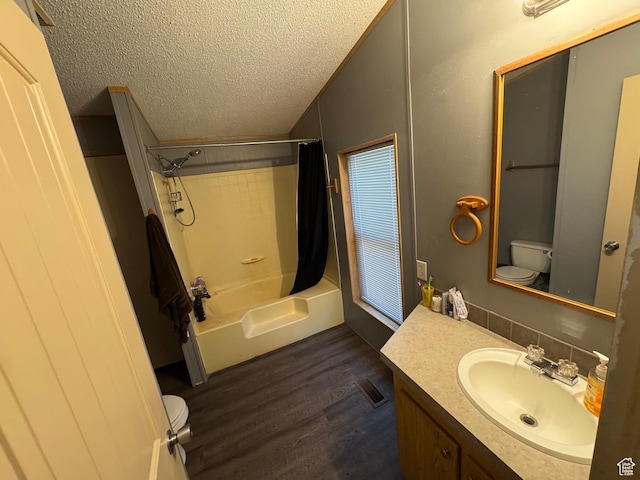 1082 W 650 S, Vernal, UT 84078 - full bathroom featuring a textured ceiling, vanity, wood finished floors, and shower / bathtub combination with curtain