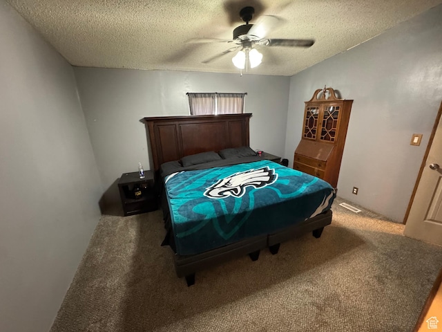 1082 W 650 S, Vernal, UT 84078 - carpeted bedroom with a textured ceiling and a ceiling fan