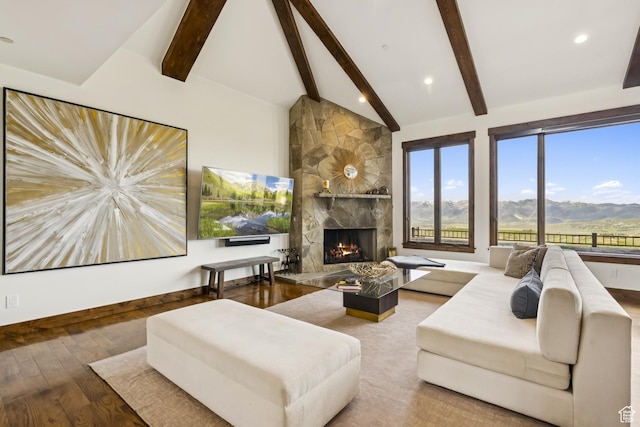 9079 Dye Cabins Dr, Park City, UT 84098 - living room with healthy amount of natural light, wood finished floors, and a large fireplace