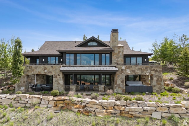 9079 Dye Cabins Dr, Park City, UT 84098 - back of house with stone siding, a chimney, a balcony, and a patio area