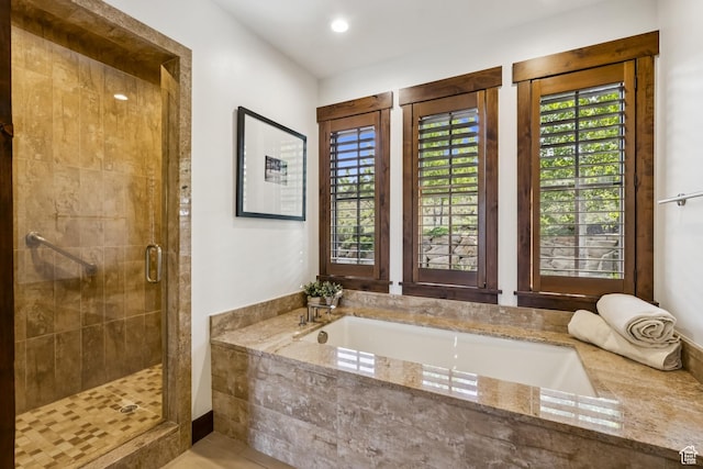 9079 Dye Cabins Dr, Park City, UT 84098 - bathroom featuring healthy amount of natural light, a stall shower, a bath, and recessed lighting