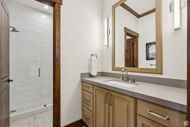 9079 Dye Cabins Dr, Park City, UT 84098 - bathroom featuring vanity, a shower stall, and crown molding