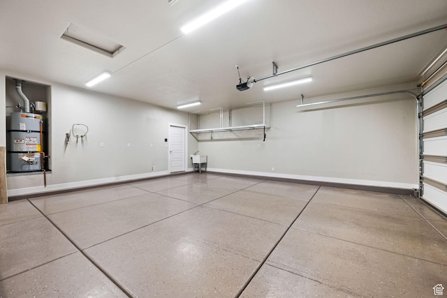 886 N Sandy Talus Dr, Washington, UT 84780 - garage featuring secured water heater and a garage door opener