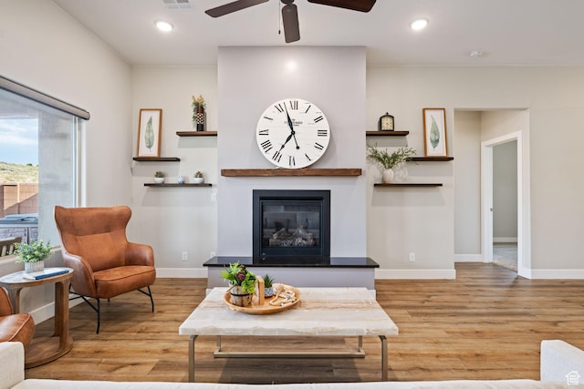 886 N Sandy Talus Dr, Washington, UT 84780 - living room with ceiling fan, light wood-style floors, a fireplace, and recessed lighting