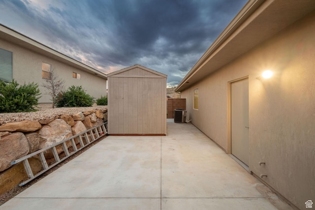 886 N Sandy Talus Dr, Washington, UT 84780 - view of patio / terrace with a storage shed