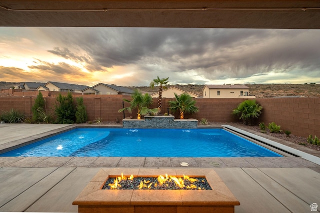886 N Sandy Talus Dr, Washington, UT 84780 - view of pool with a fire pit and a fenced backyard