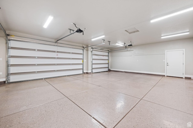 886 N Sandy Talus Dr, Washington, UT 84780 - garage featuring a garage door opener