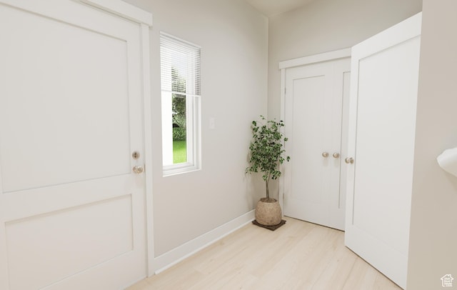 1343 N 1390 E Unit 27-104, Payson, UT 84651 - entryway with light wood finished floors and baseboards