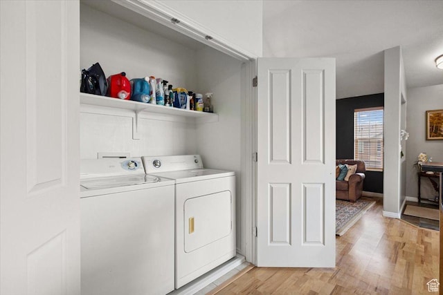 1049 W Allington Dr N, North Salt Lake, UT 84054 - laundry room with washer and dryer and light wood finished floors