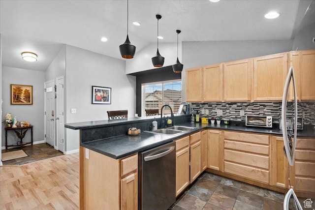 1049 W Allington Dr N, North Salt Lake, UT 84054 - kitchen with stainless steel dishwasher, light brown cabinets, lofted ceiling, dark countertops, and tasteful backsplash