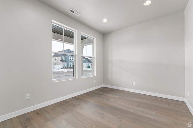 1918 S 2475 W, West Haven, UT 84401 - empty room with wood finished floors and recessed lighting
