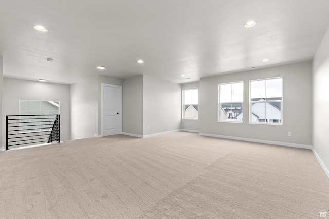 1918 S 2475 W, West Haven, UT 84401 - unfurnished living room with light colored carpet and recessed lighting