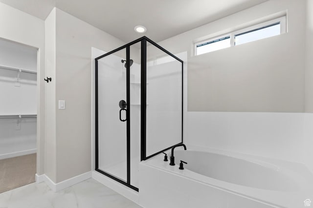 1918 S 2475 W, West Haven, UT 84401 - bathroom with a garden tub, a stall shower, a spacious closet, marble look tiles, and recessed lighting